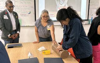 Students during stop the bleed training.